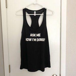 NWOT - Black tank top with hidden message when flip up the bottom